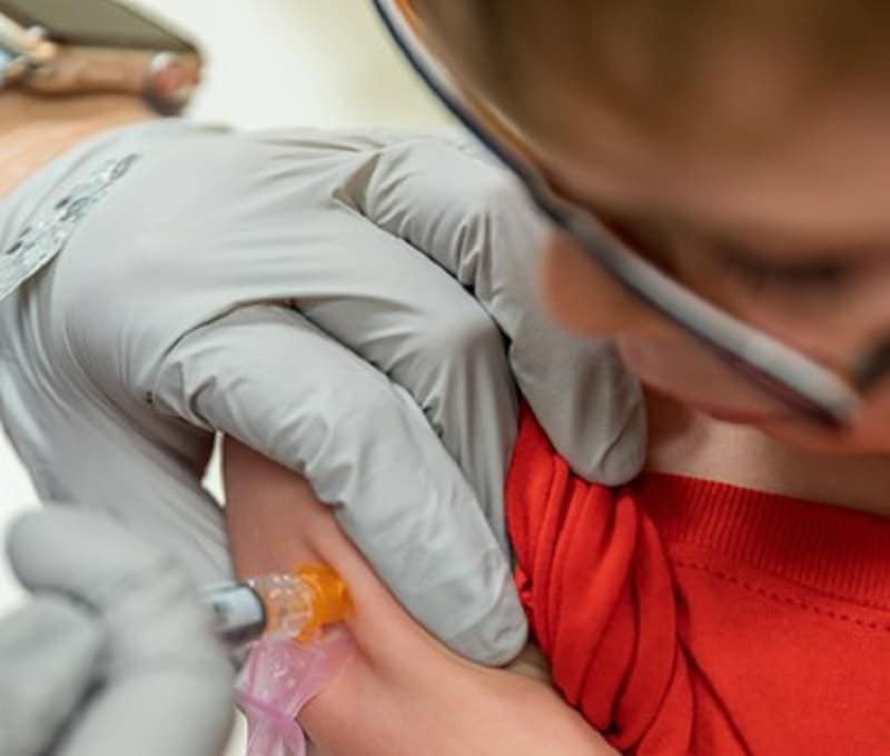 boy getting vaccine