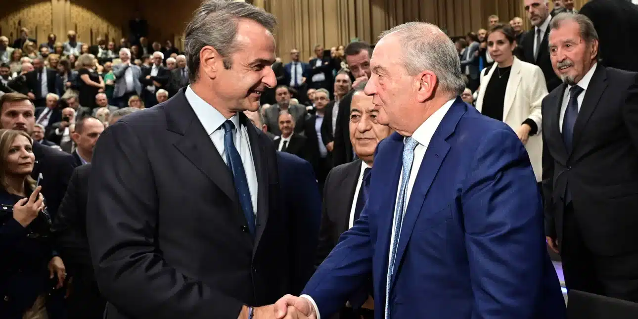 mitsotakis karamanlis handshake.jpg